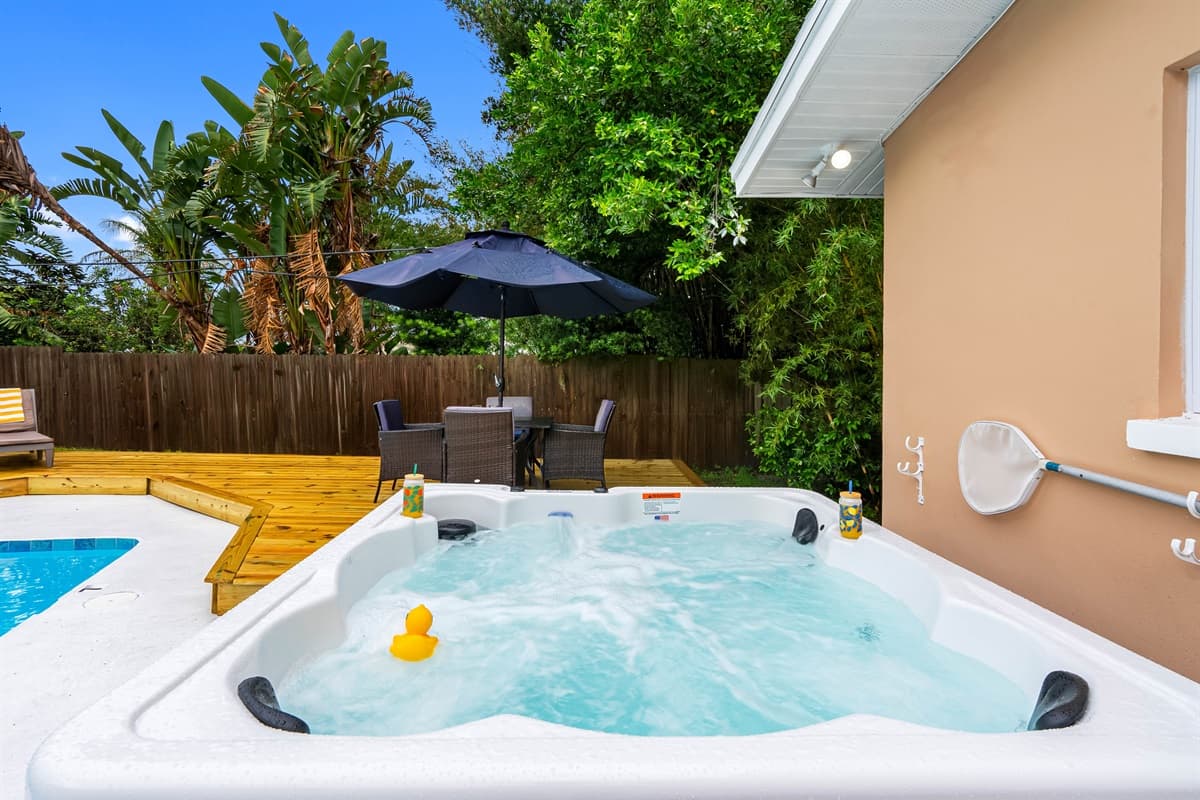Vacation mode: activated. Lounge by the pool, soak in the spa, or sip something cool beneath the palms.