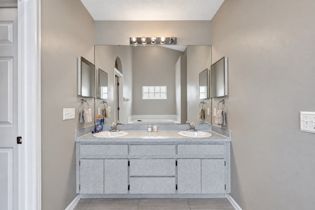 This tranquil space has been thoughtfully designed to provide a sanctuary for your personal care rituals, ensuring a blissful experience during your stay.