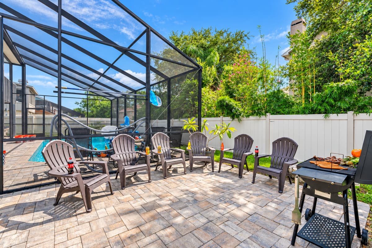 Fire up the grill and gather around the firepit! This backyard is fully equipped for outdoor feasts, complete with plenty of seating for your whole group.