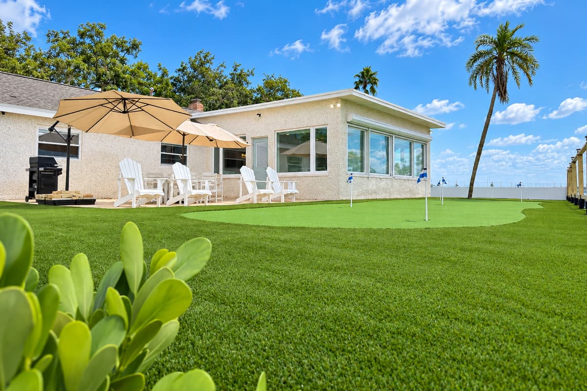 Waterfront patio with outdoor dining and places to relax.