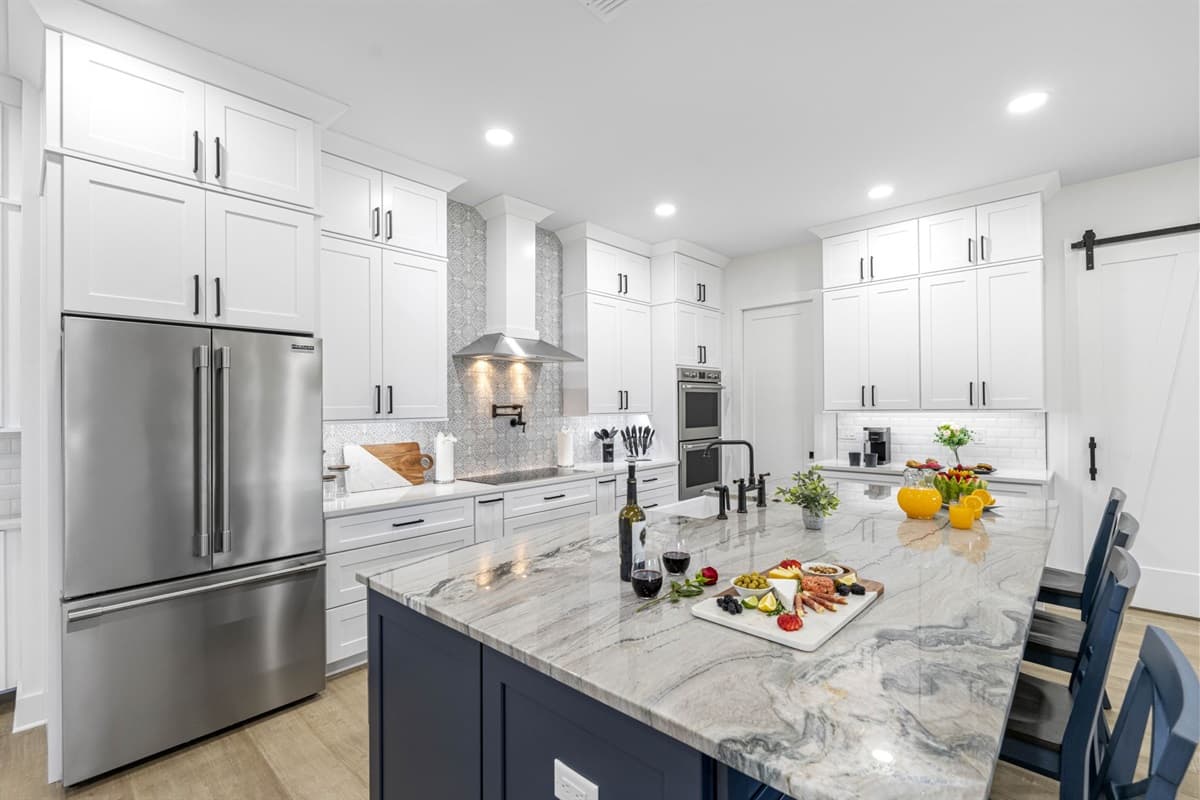 A spacious refrigerator, perfect for storing fresh ingredients, beverages, and all your culinary essentials. 