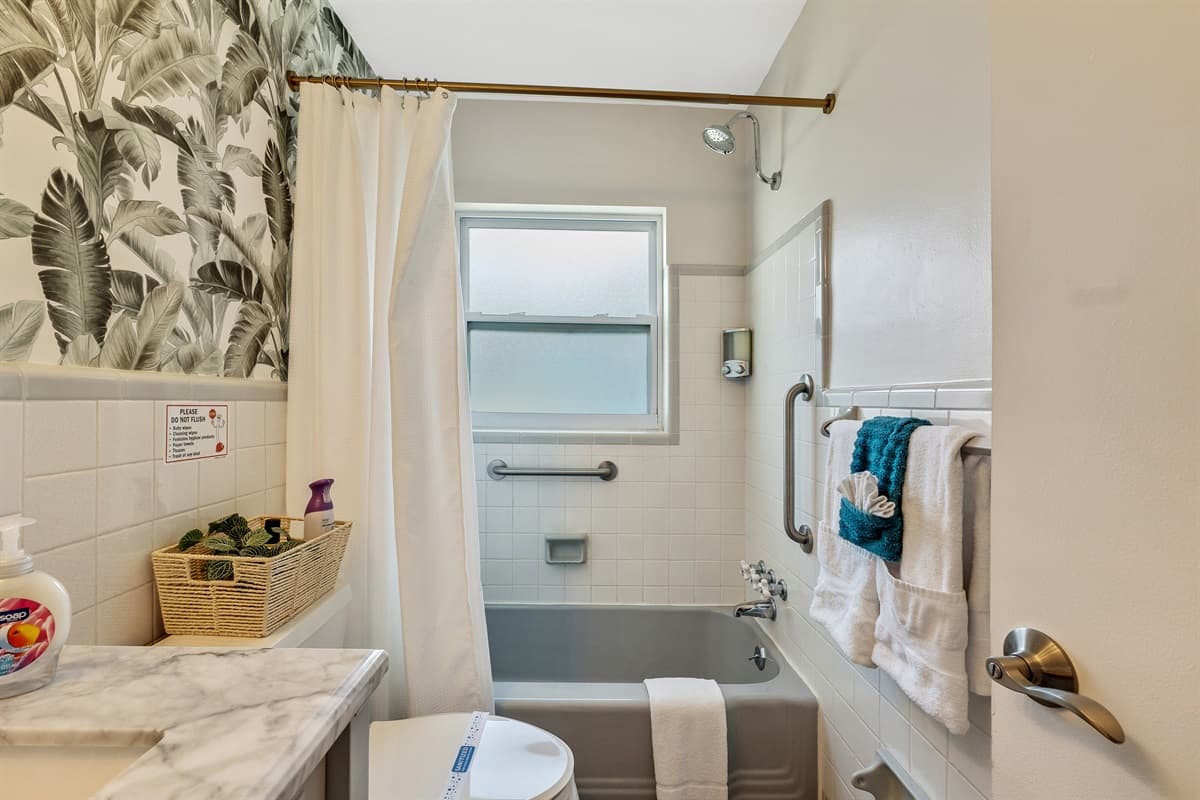 The striking design of this space, create a sense of being immersed in a verdant jungle or a secluded island retreat.