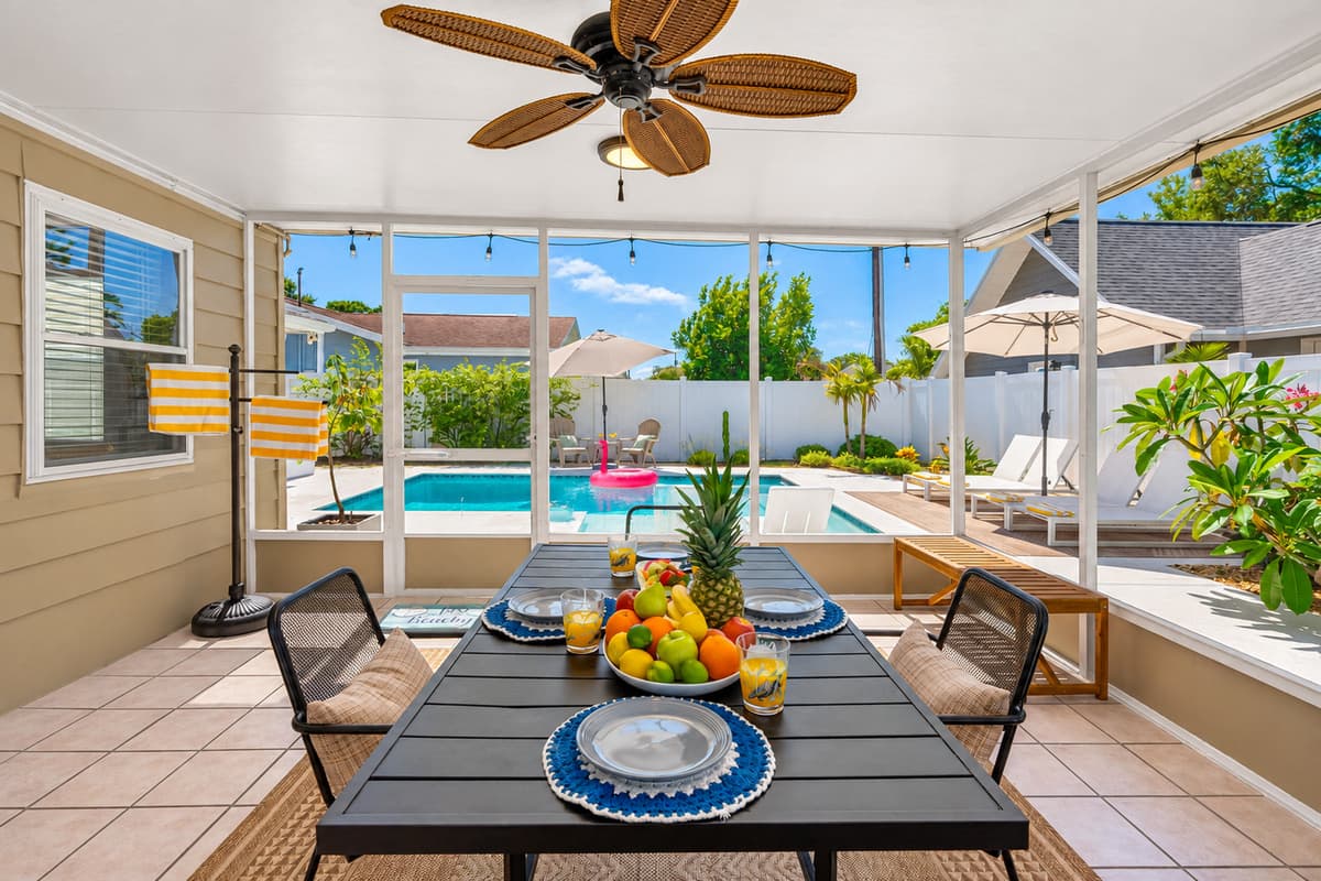 This airy patio is your front-row seat to the pool and garden. With comfortable seating and vibrant fruit-forward decor, it's perfect for both lounging and entertaining.