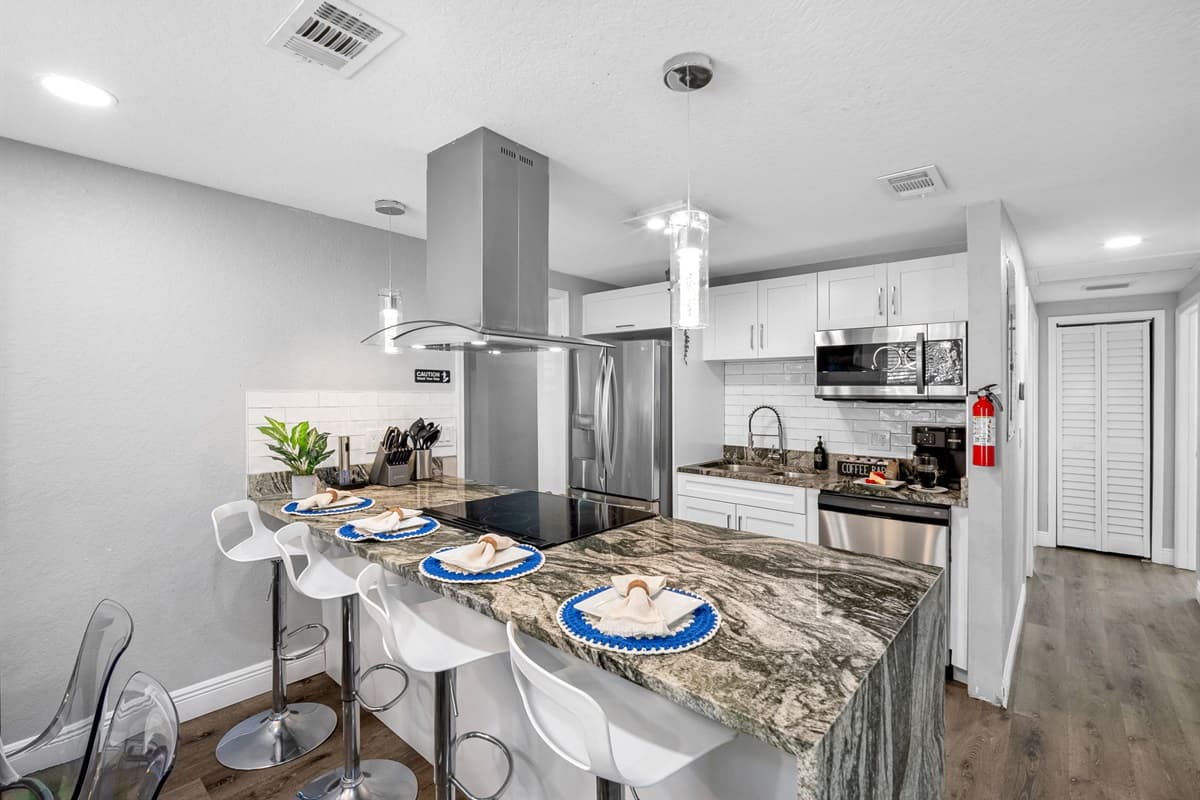 A bright, open kitchen that connects seamlessly to the dining and living areas — perfect for entertaining.