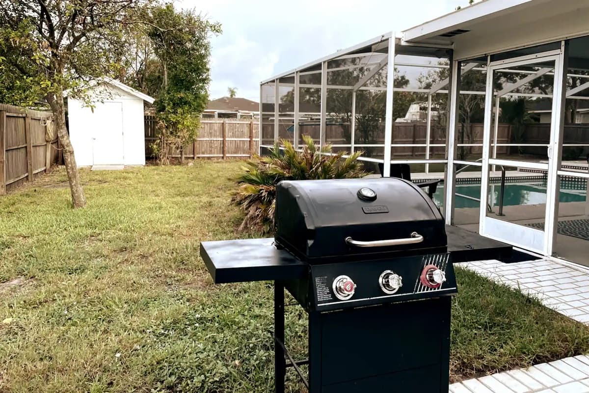 In our backyard, adjacent to the pool area, you'll find a grill ready for use. Savor the delight of freshly grilled meals as they steam and sizzle to perfection.