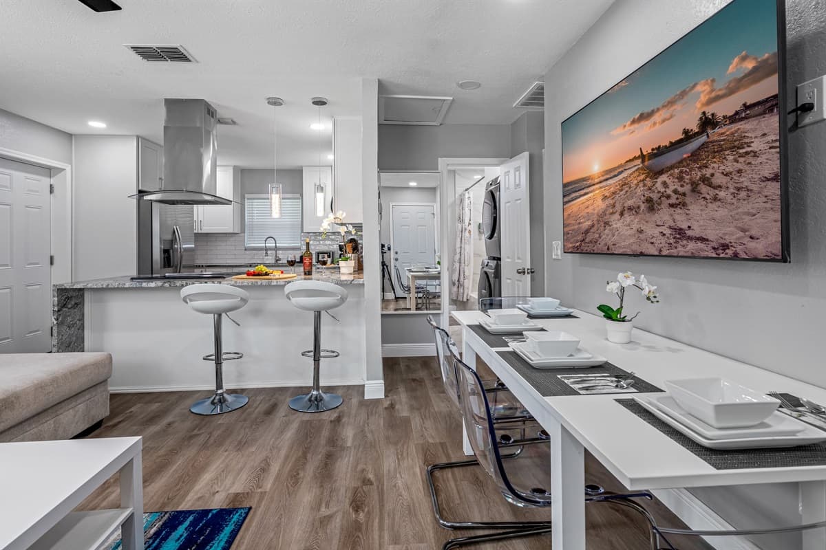 Who wouldn't love the open concept of our beautiful dining area and modern fully equipped kitchen. Cherish wonderful memories with family and friends while on vacation.
