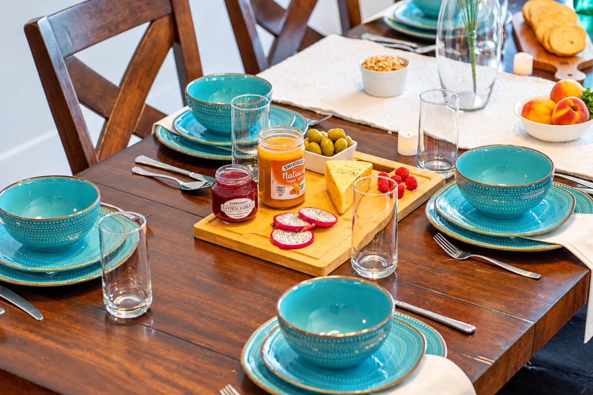 The perfect setting for delicious meals and quality time, this dining space offers charm, warmth, and plenty of seating for the whole group