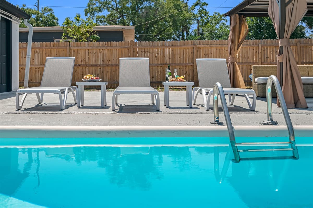 The combination of sleek, modern design and natural beauty creates a stunning backdrop that will make you feel like you've escaped to your own private paradise.