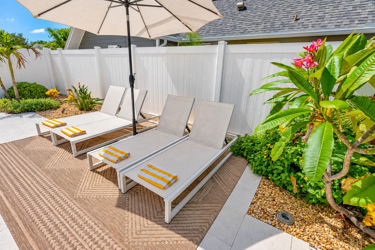 Lounge poolside with a cold drink, fire up the grill, or gather around the outdoor dining table with your crew.