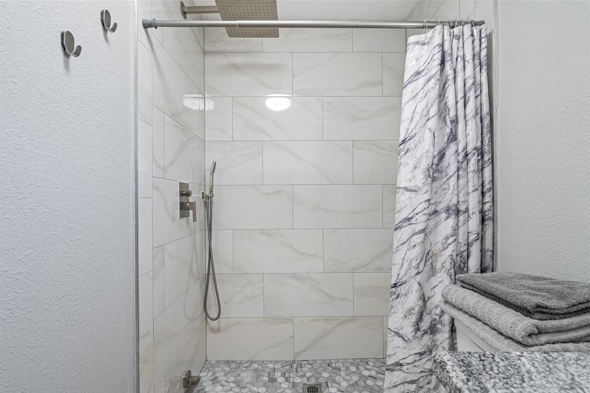 The combination of neutral tones and modern finishes creates a timeless and versatile space that will appeal to even the most discerning traveler.