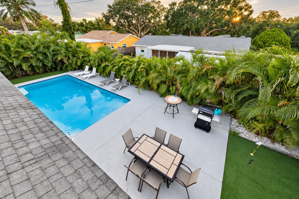 This home’s outdoor living area offers resort-style amenities with the comfort of privacy.