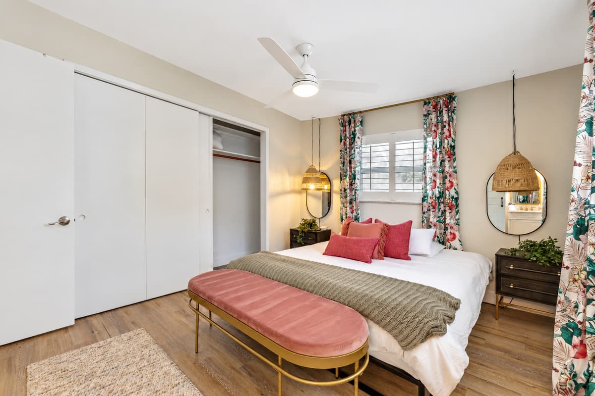 Adjacent to the sleeping area, the ensuite bathroom offers a private retreat of luxury and convenience.