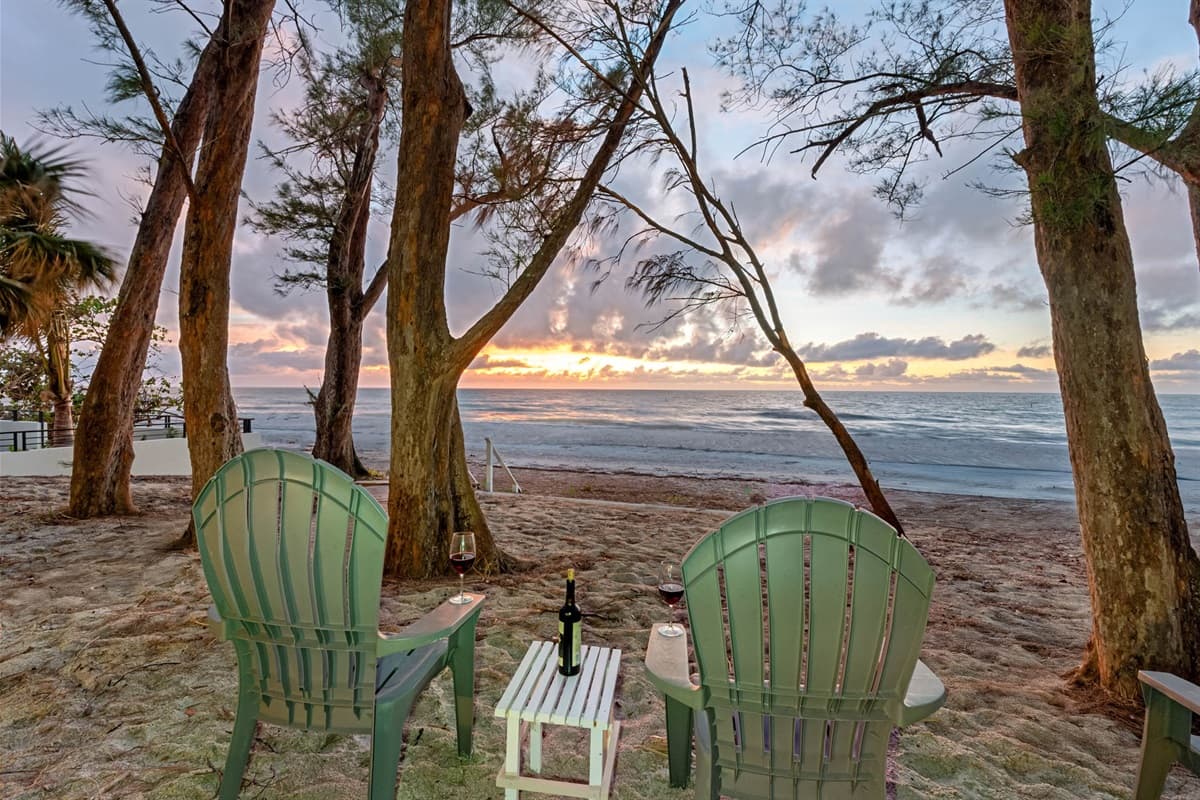 Whether you're reading a book, enjoying a cold drink, or simply relaxing in nature, this private beach area offers the ideal setting for a restful day by the sea.