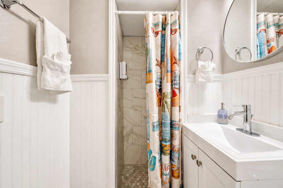 The vanity area is a testament to both practicality and aesthetics.