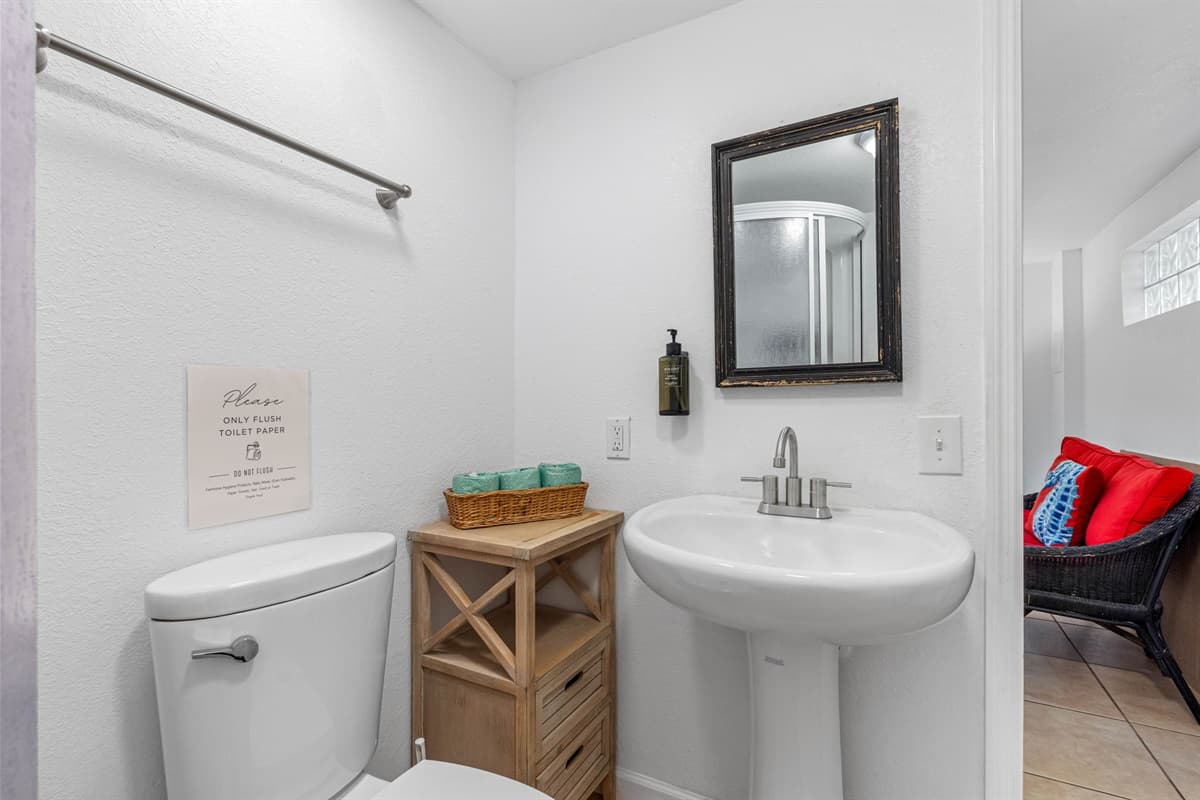 The minimalist design ensures easy upkeep and adds to the overall modern aesthetic of the bathroom..