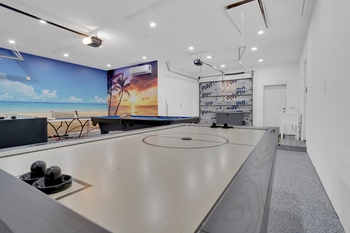 Play air hockey with a sunset view! Our custom beach mural creates the ideal atmosphere while you have fun. The perfect spot to unwind and compete on your next vacation getaway.