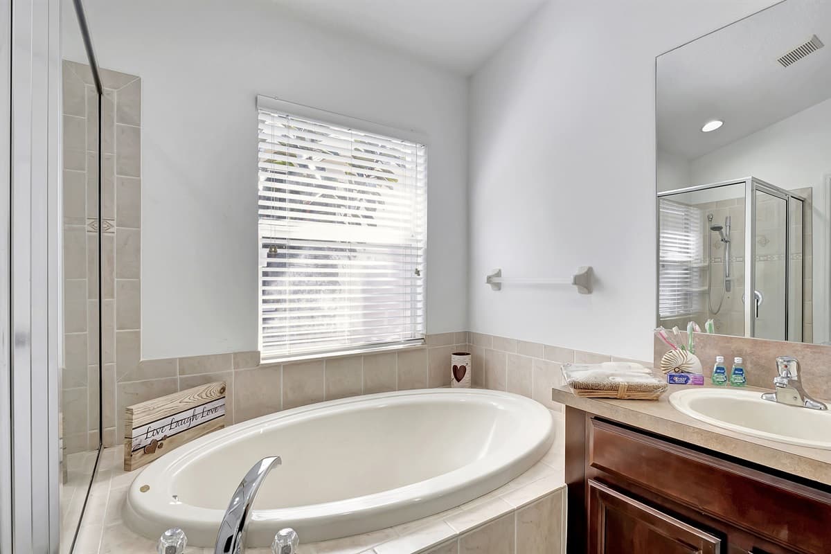 The centerpiece of this bathroom is the inviting bathtub, a haven of relaxation.