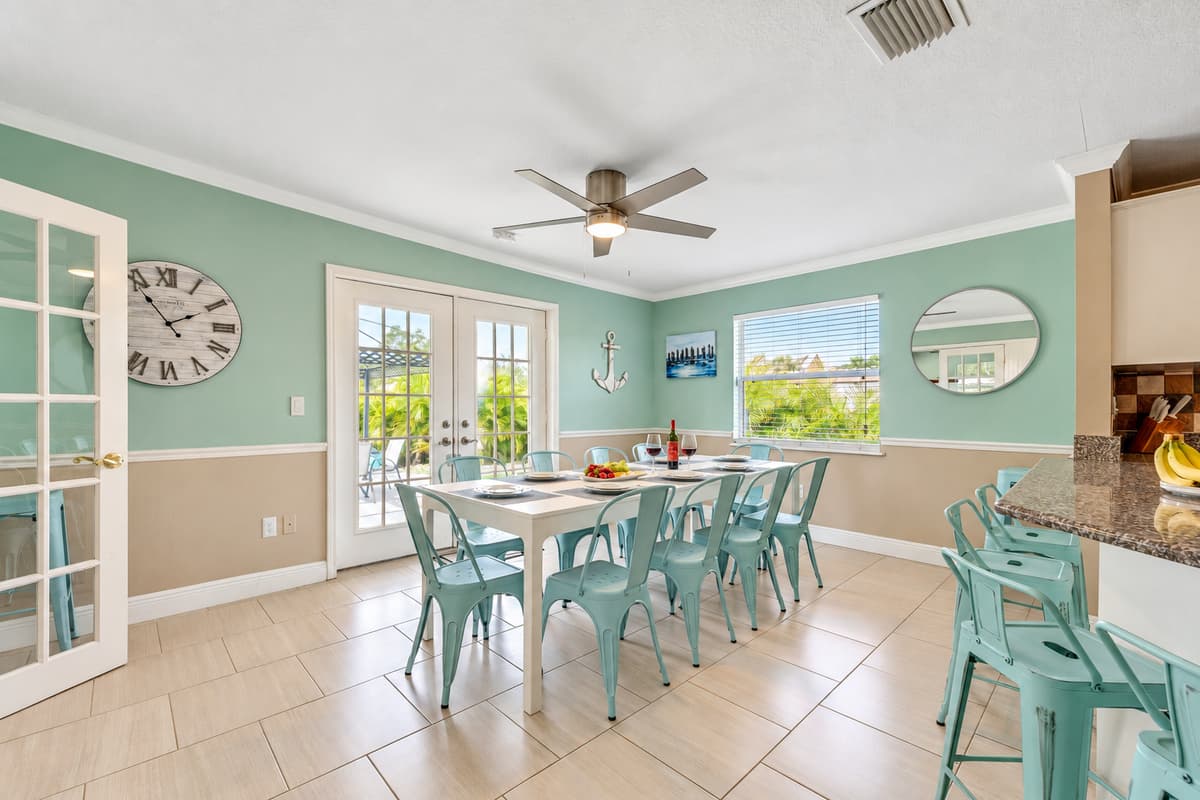 With expansive windows allowing natural light to flood the space, this well-lit dining area is a haven for enjoying delicious meals.