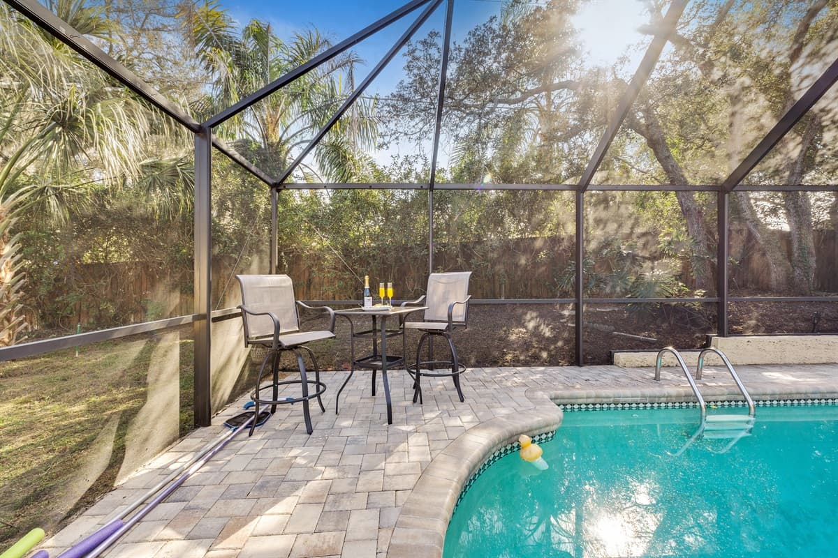 The heated pool assumes a fresh and enchanting allure.