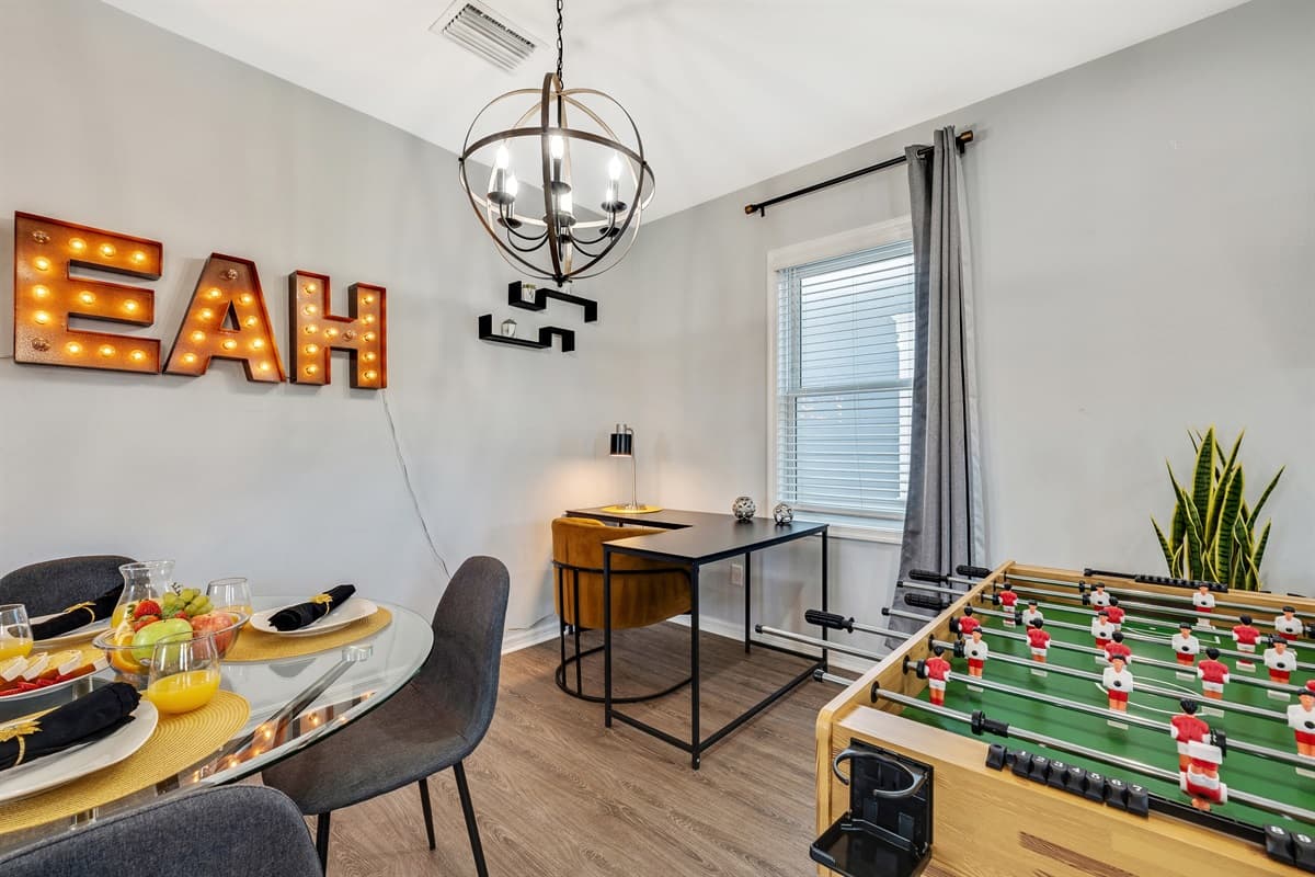 Crafted with precision and sporting a classic design, the table invites enthusiasts to engage in thrilling matches that echo the cheers and excitement of a stadium.