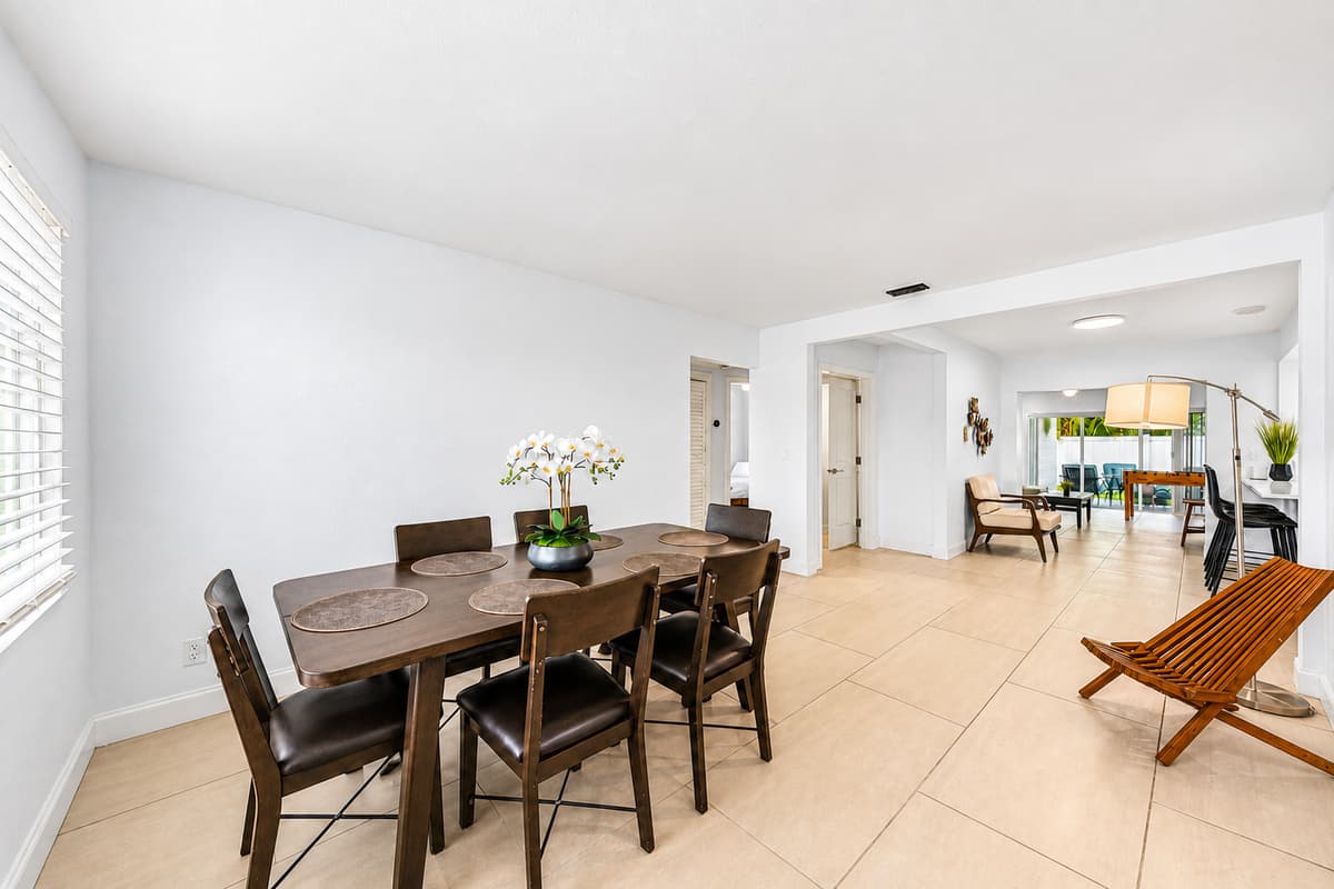 Open-concept dining area with modern décor and seamless flow into the main living spaces.
