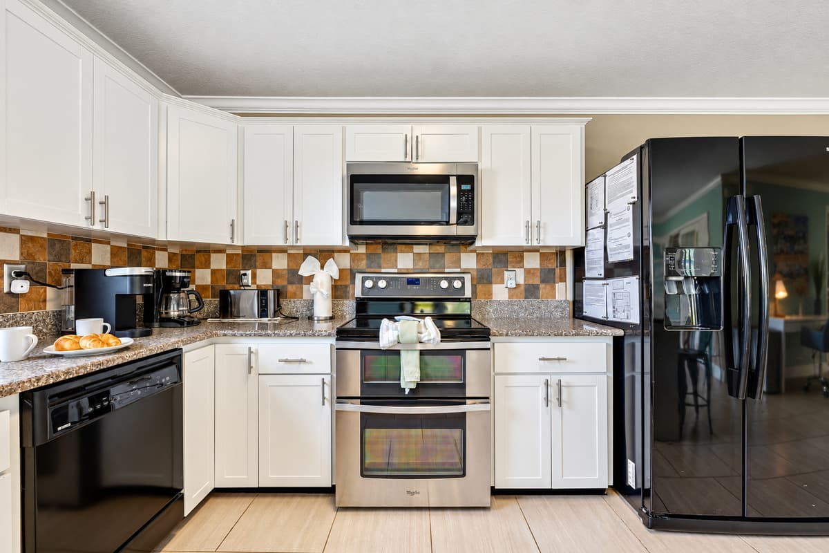 Step into our well-appointed kitchen, a haven for culinary enthusiasts and family gatherings alike.