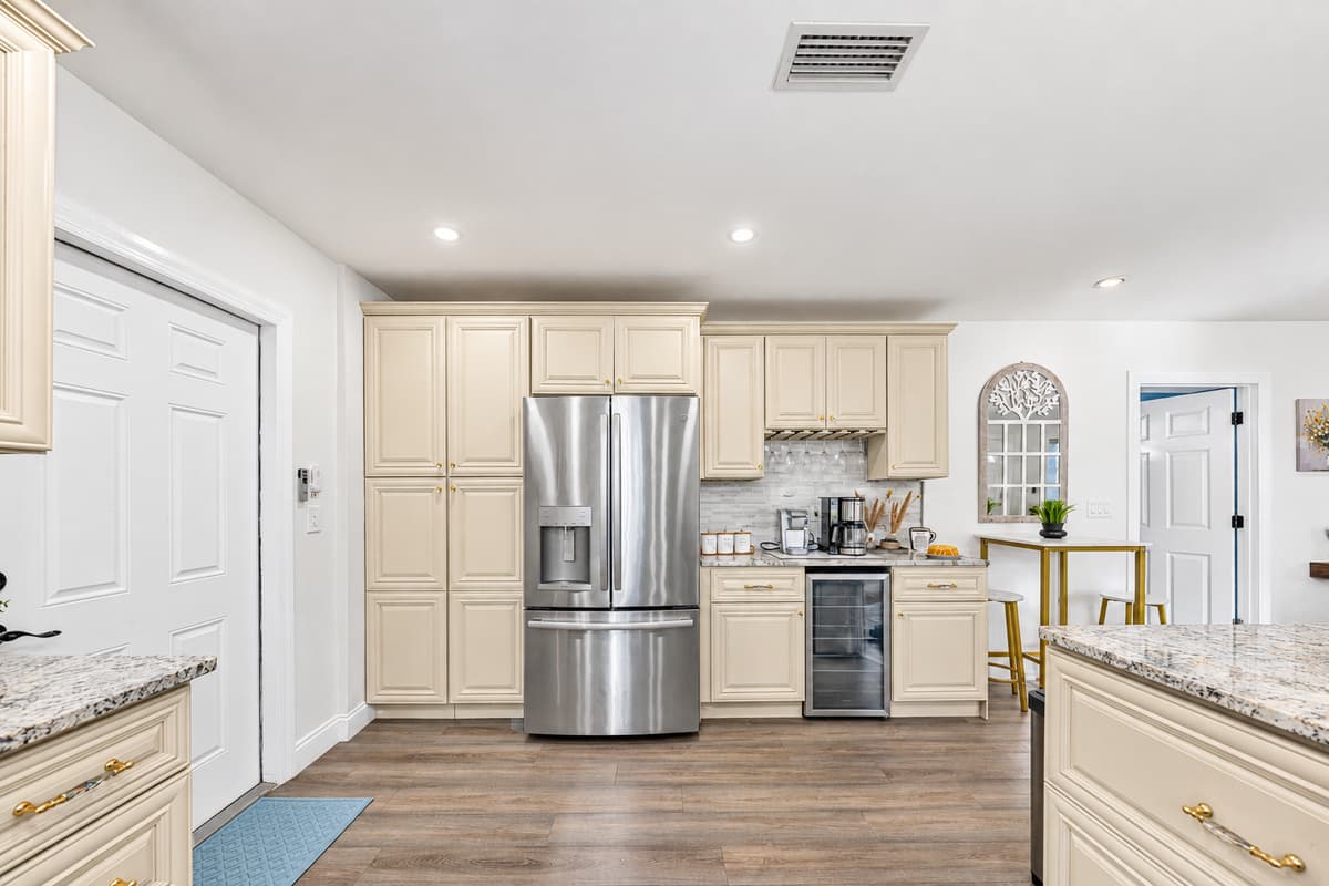 A thoughtfully designed kitchen featuring premium finishes, ample prep space, and everything you need for a comfortable stay.