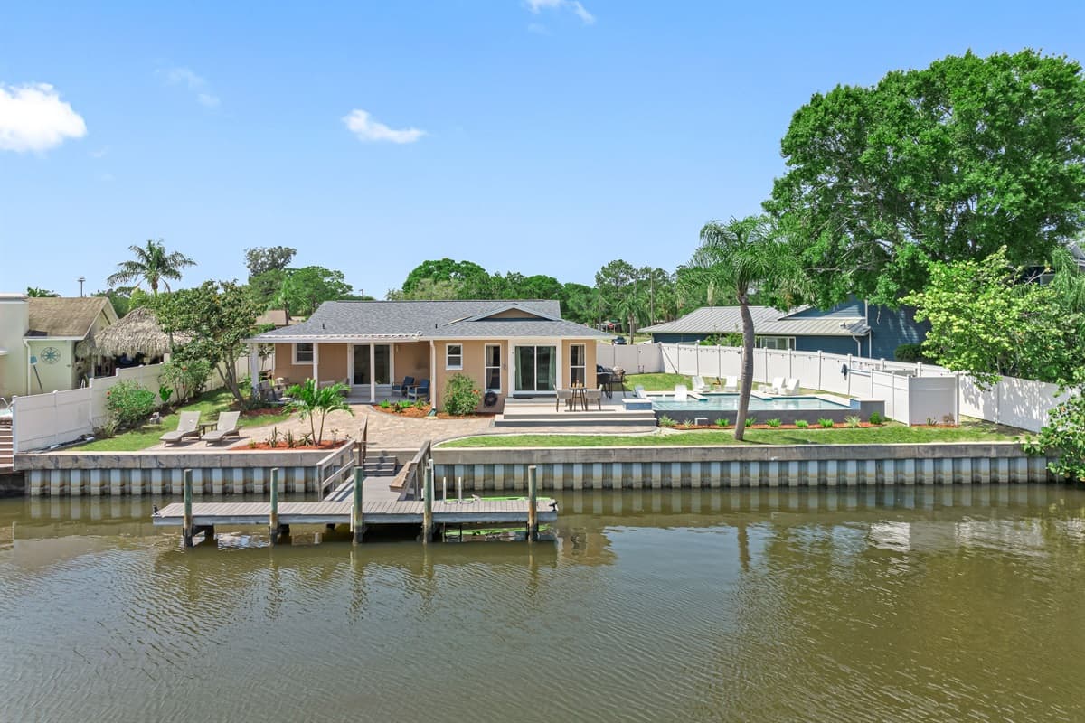 Nestled along the tranquil shores of a picturesque water canal, this architectural masterpiece offers a truly exceptional living experience.