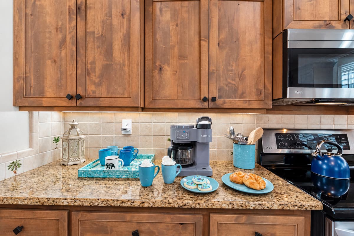 The open layout seamlessly connects the kitchen to dining areas, making hosting easy and enjoyable.