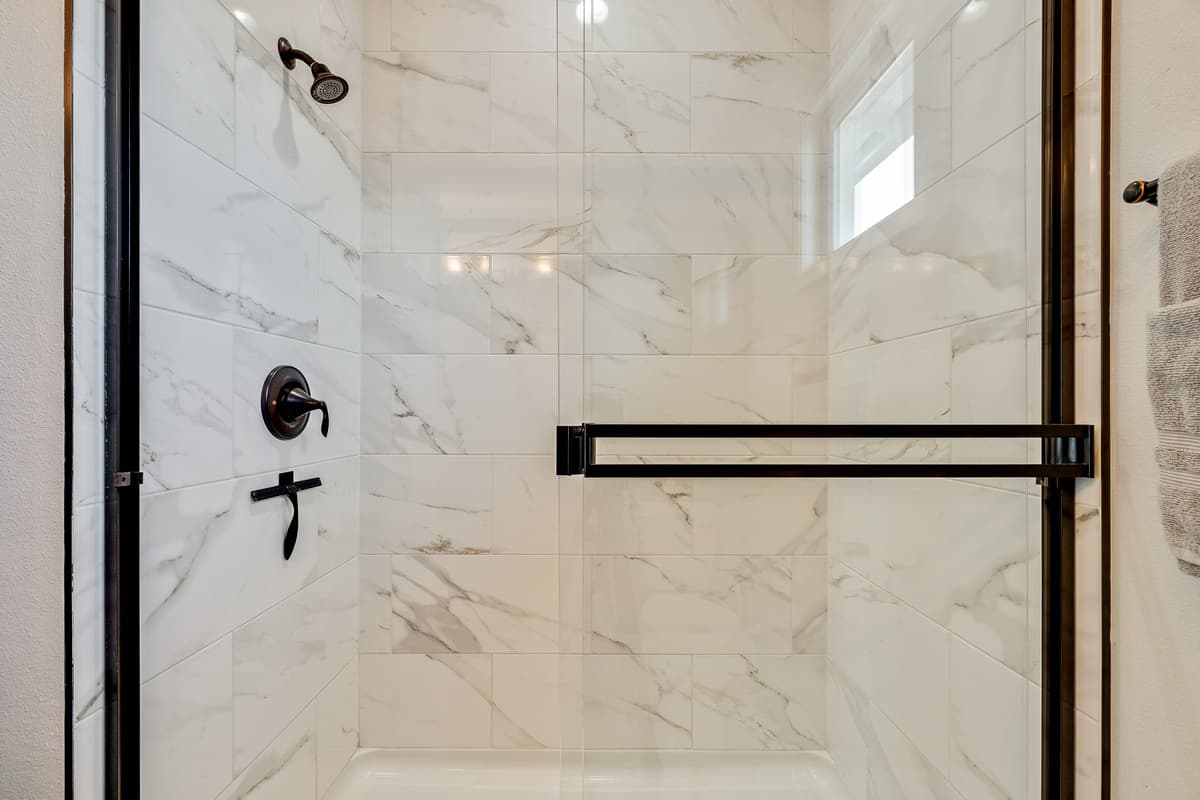 This bathroom, an epitome of contemporary efficiency, boasts a sleek design and cutting-edge features for optimal functionality.