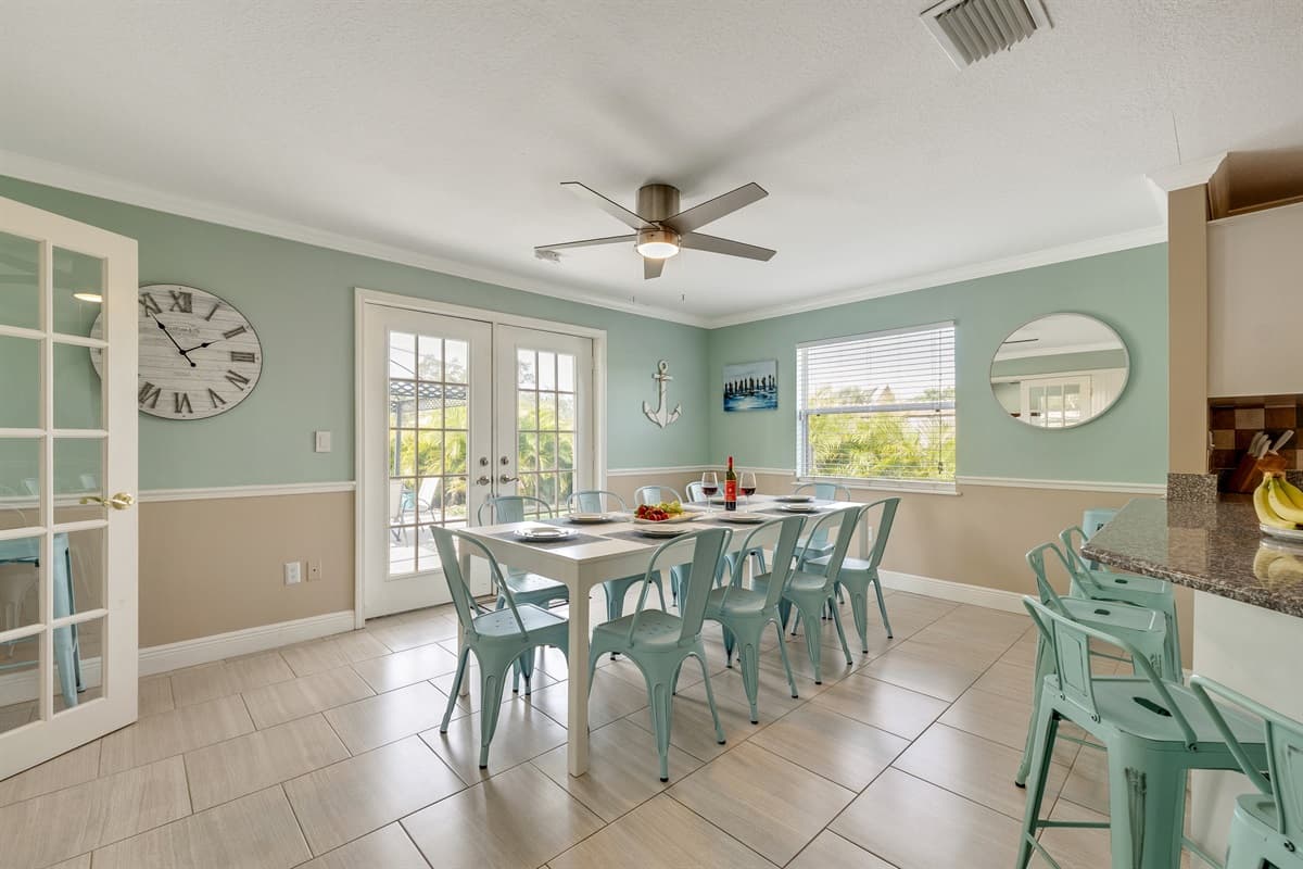 With expansive windows allowing natural light to flood the space, this well-lit dining area is a haven for enjoying delicious meals.