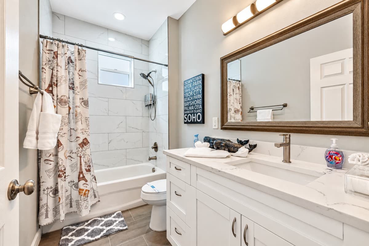 Thoughtfully designed to maximize space, this room features modern fixtures, smart storage solutions, and a minimalist aesthetic.