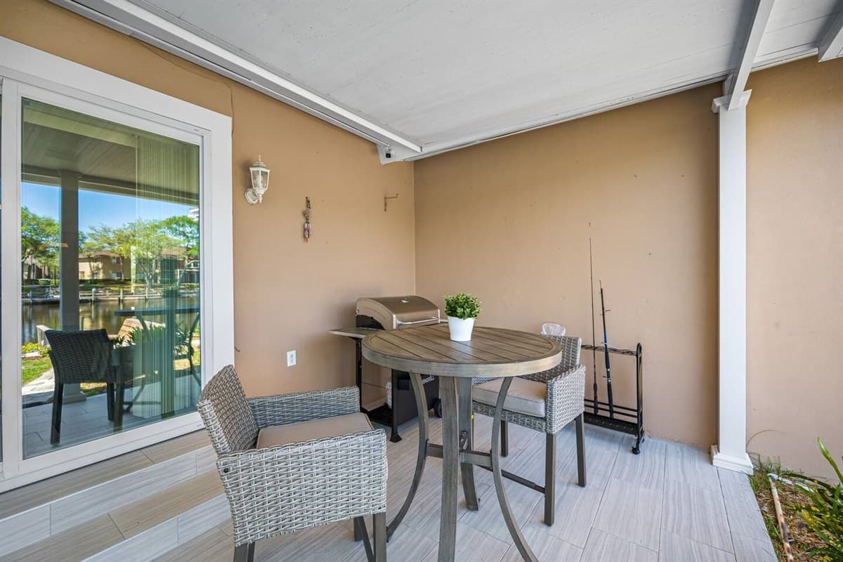 Outdoor sitting/ dinning area. Enjoy the view of the lake while having a chat, snacks or even meals with family and friends. Created impeccable memories in this wonderful property. Send us an inquiry now!