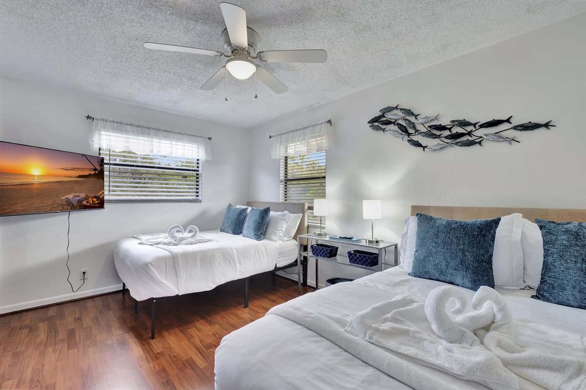 The room's decor is a harmonious blend of modern elegance and cozy charm, with carefully selected furnishings and accents that enhance the overall ambiance.