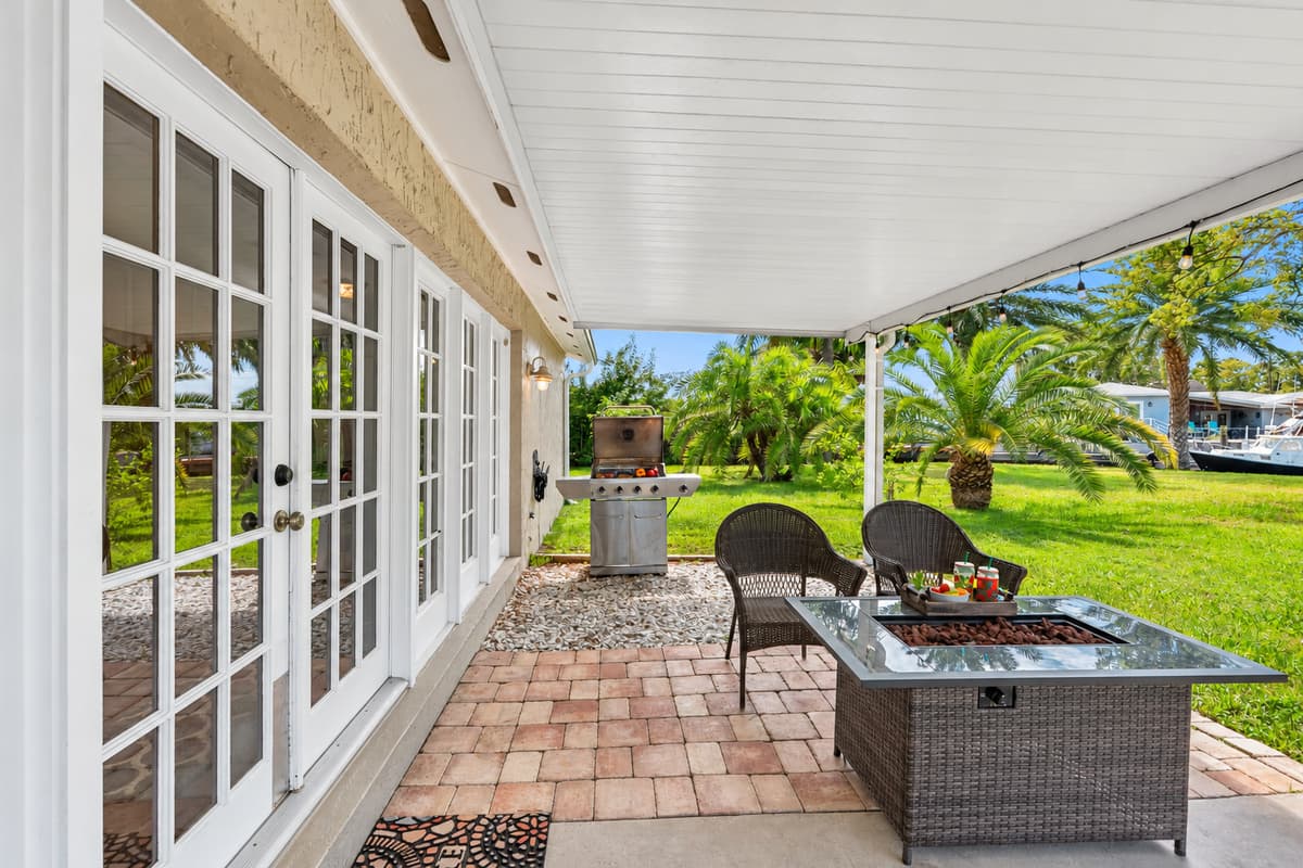 The covered design allows for year-round enjoyment, whether you’re grilling in the afternoon or relaxing by the fire on a cool evening.