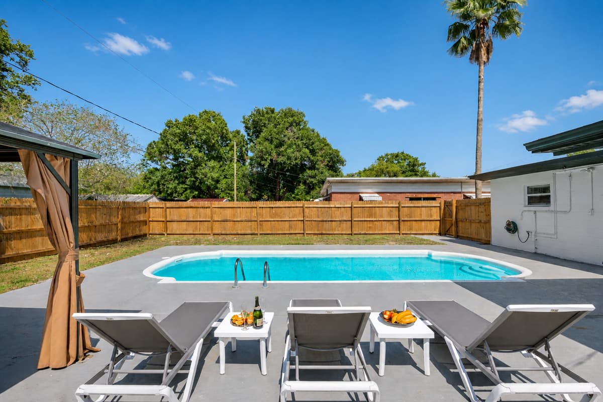 Step outside into the enchanting outdoor common space by the pool, where relaxation and leisure await you.