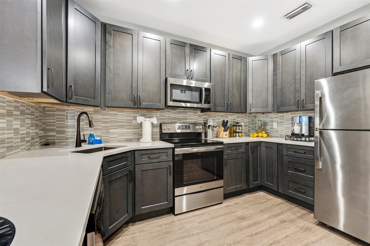 Equipped with state-of-the-art appliances, the kitchen is a haven for aspiring chefs and seasoned cooks alike.