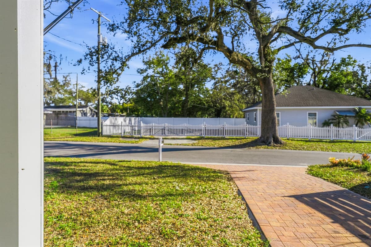 Tucked beneath the shade of Seminole Heights' iconic century-old live oak trees, this brand-new home perfectly captures the magic of one of Tampa's most beloved and walkable neighborhoods — vibrant, historic, and full of character.
