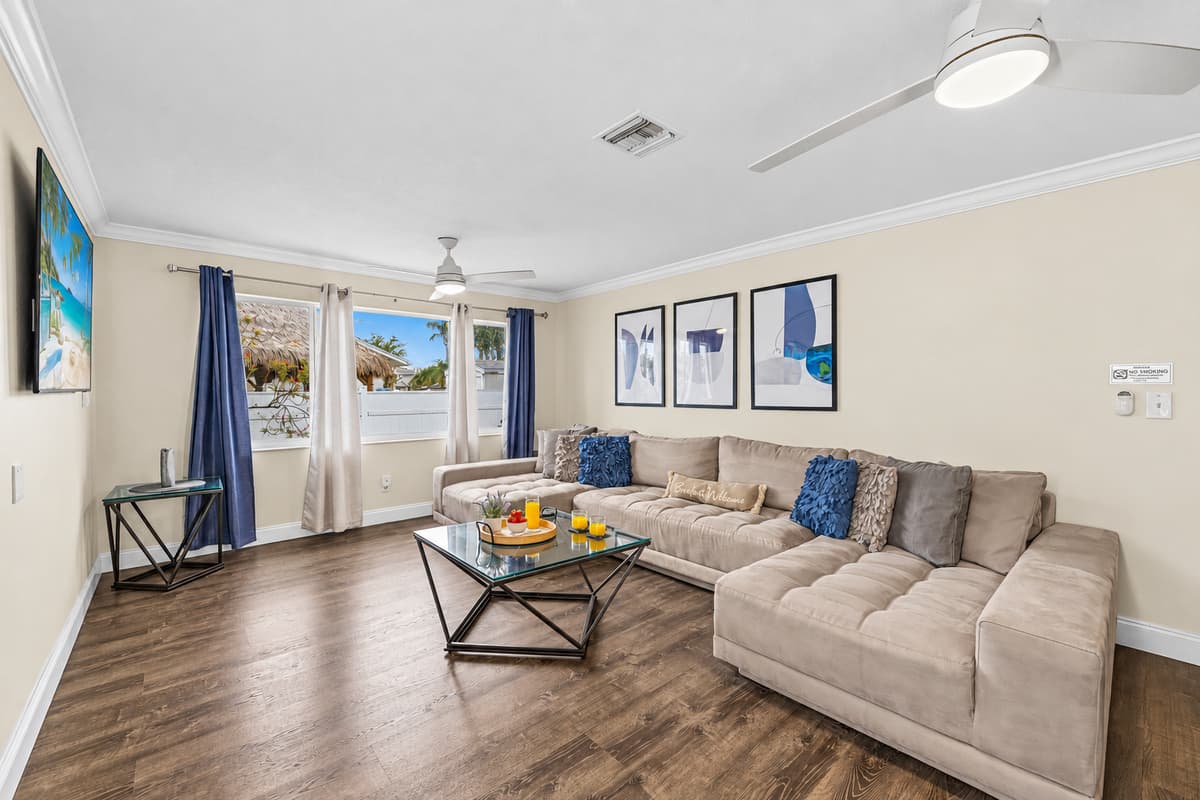 Gather together in the cozy living room with ample seating for the whole group.
