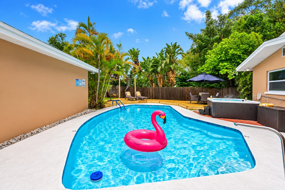 A kid-friendly pool, plenty of deck space, and outdoor games make this the ultimate family hangout.