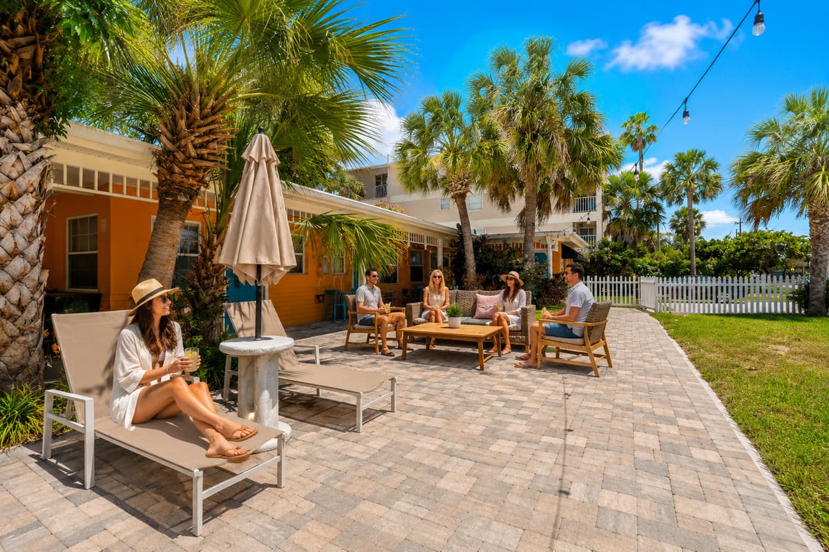 Soak up the Florida sunshine in the beautifully landscaped outdoor courtyard with plenty of seating for relaxing, dining, or gathering with friends.