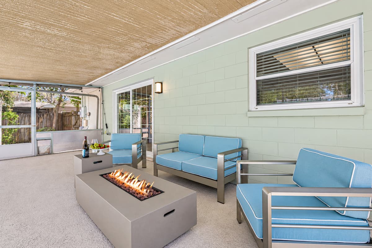 As you sit and enjoy the warmth of the fireplace, you'll be surrounded by the beauty of the outdoors (Fire feature disabled per insurance requirements)