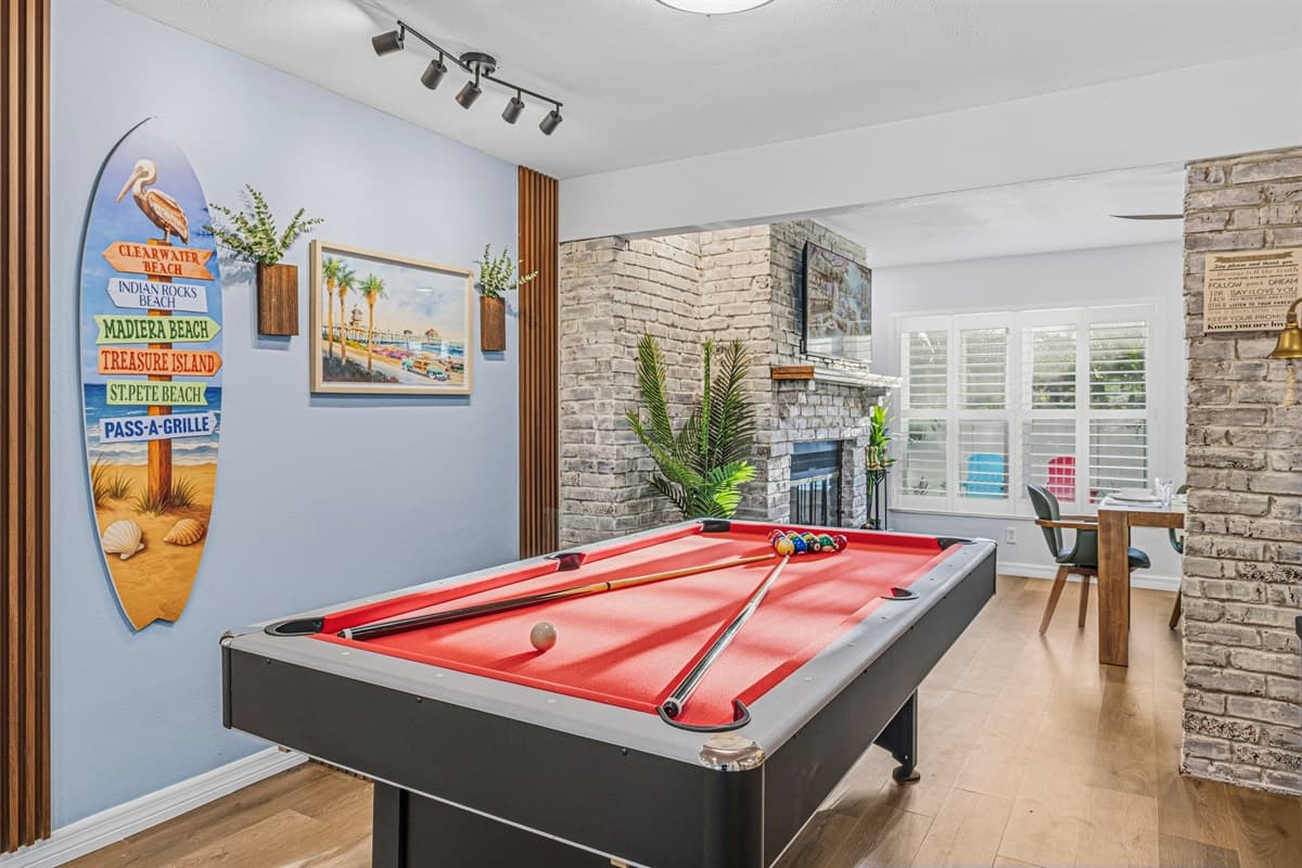 Game room with pool table and unique design touches—ideal for relaxing and unwinding 