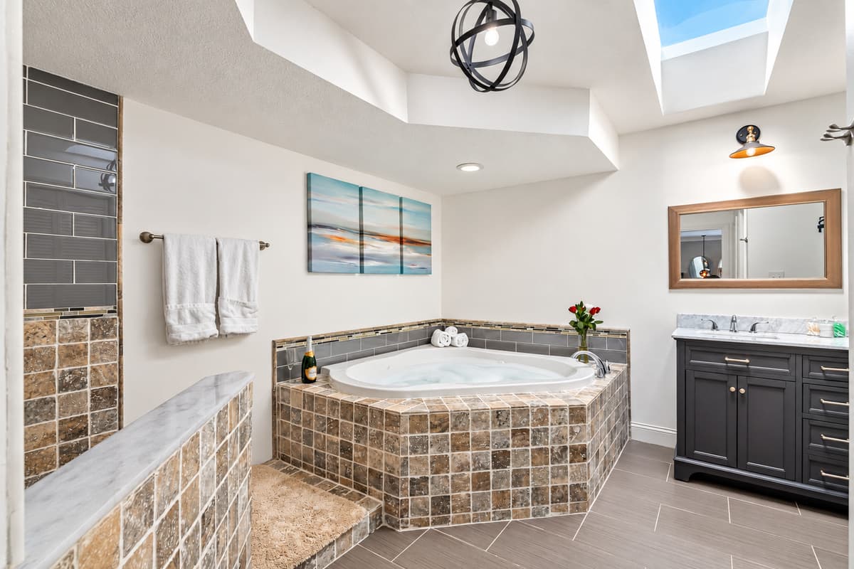 Unwind, rejuvenate, and indulge in a world of relaxation with our sensational bathroom and hot tub.