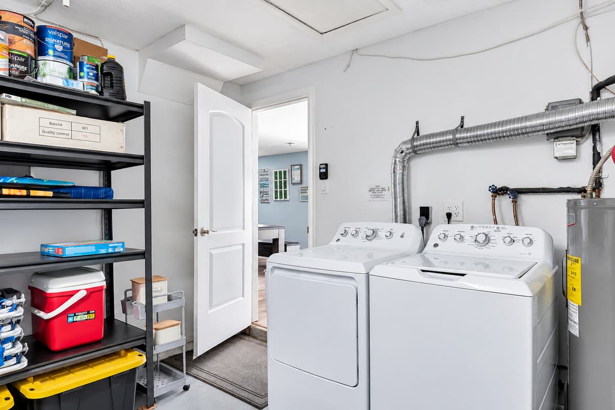 Our laundry area is equipped with a full washer and dryer setup, along with all the essential laundry supplies you need.