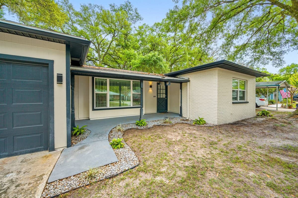 The immaculate front side of the house that welcomes you to home away from home. It will make you feel at home while you're home away from home! Send us a message!