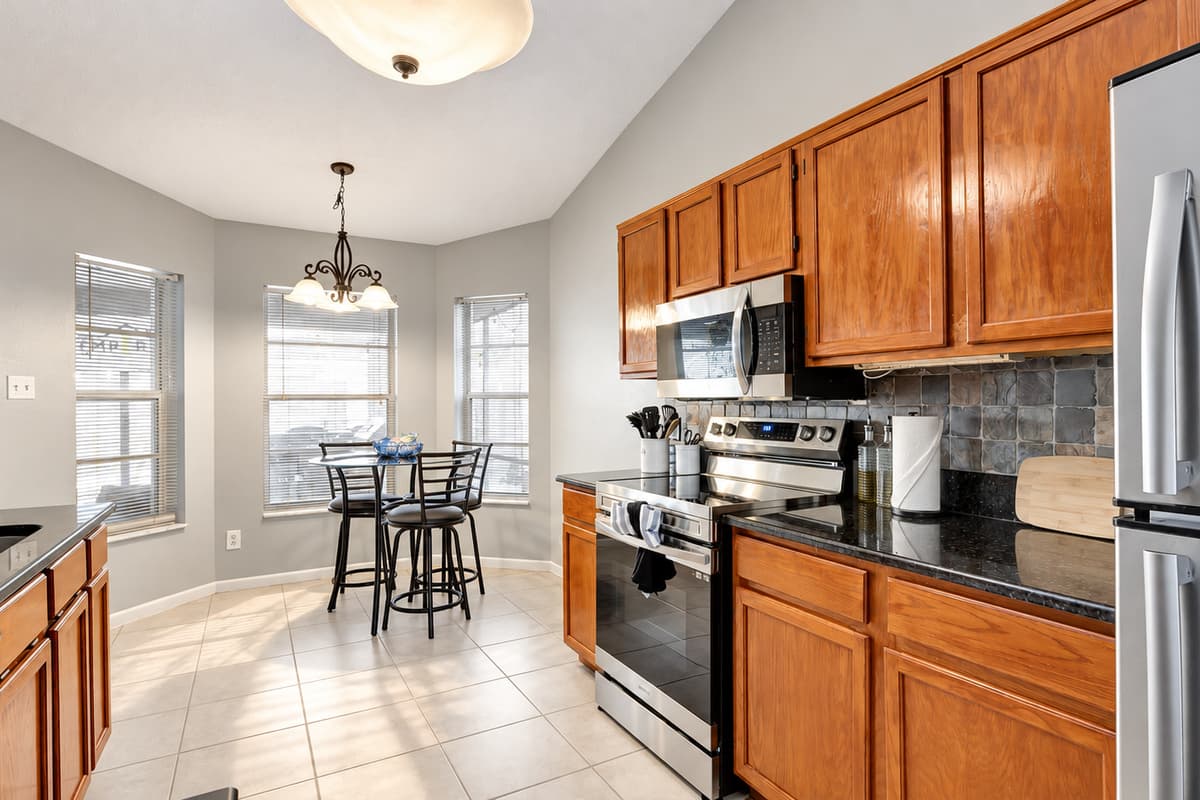 Embrace the art of cooking surrounded by top-of-the-line modern appliances, where every meal becomes a masterpiece.