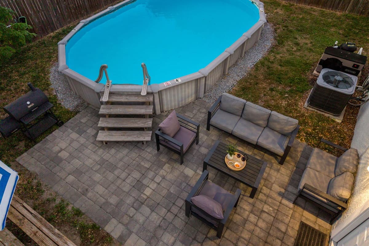 Enjoy warm afternoons spent lounging by this inviting poolside retreat.