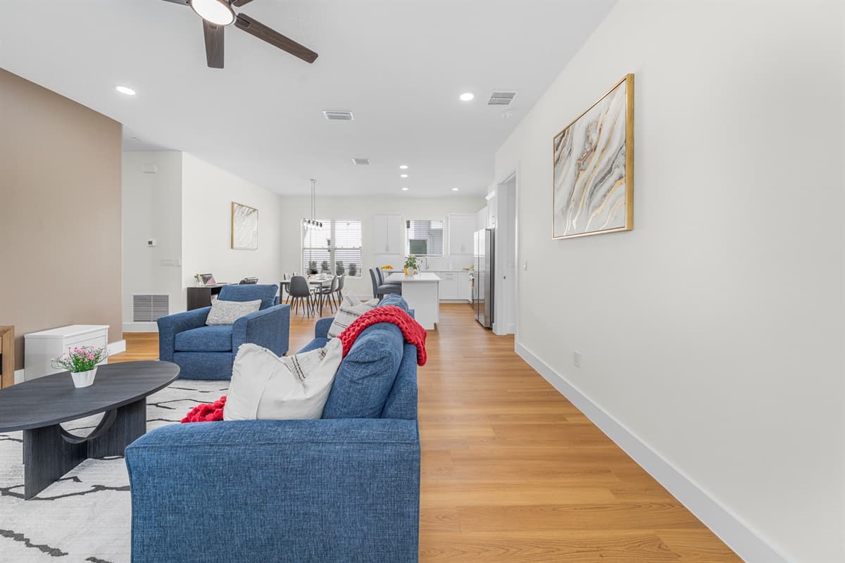 Wide-angle view of the open living space showcasing generous layout and modern design.