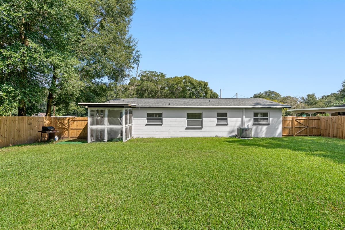 The beautiful fully fenced backyard where your family and friends can hang out! Have barbeque or grilled steak since we have a grill ready for you guys to use! Send us a message about this property now!